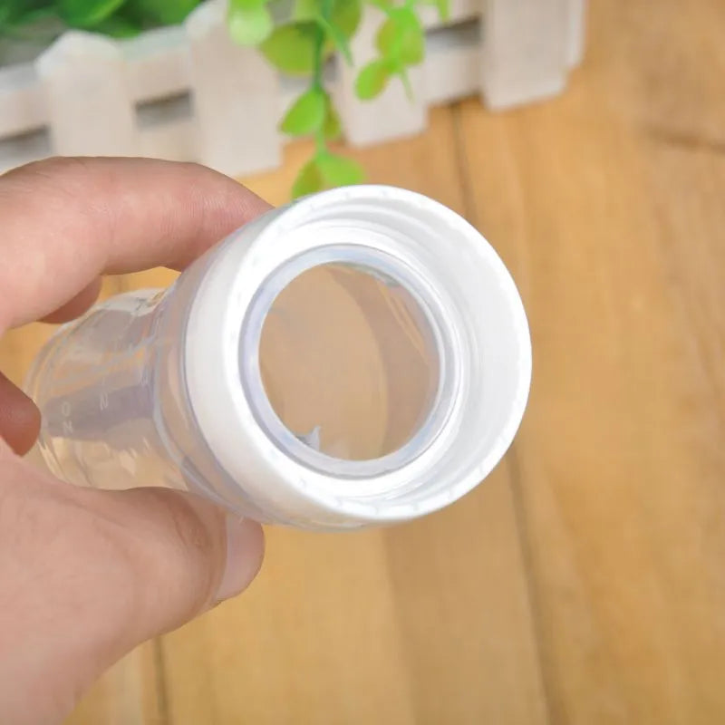 EasyBottle™ Biberon avec cuillère pour nouveau-né | Bébé